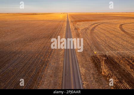 Turpin, Oklahoma, US Highway 64 runs between farms in the Oklahoma panhandle Stock Photo