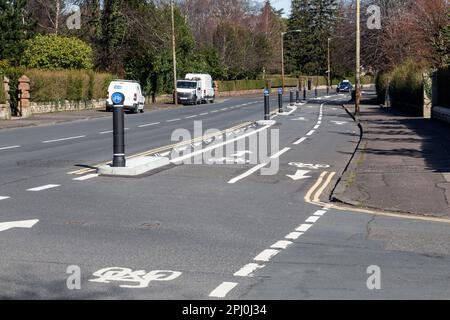 Seggregated cycle lanes on the South West City Way bike route on St Andrews Drive, Glasgow, Scotland, UK, Europe Stock Photo