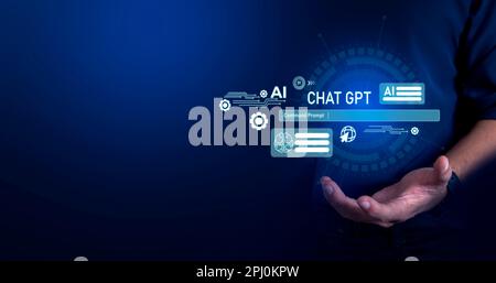 Businessman holding microchip processor with lights on the blue background. hologram digital chatbot, application, conversation assistant, AI Artifici Stock Photo