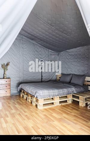 Photos of beautiful glamping in the winter forest Stock Photo