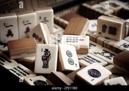 Box of antique Mahjong tiles Stock Photo