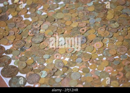 Old Indian coins collection on display. Stock Photo