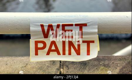 red and white wet paint sign Stock Photo