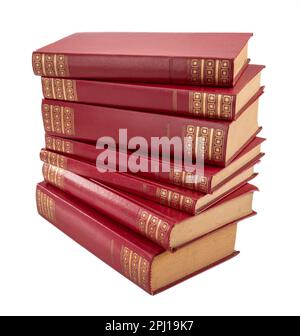 Stack of red vintage books with golden decorations on hard leather cover, isolated on white, clipping path Stock Photo