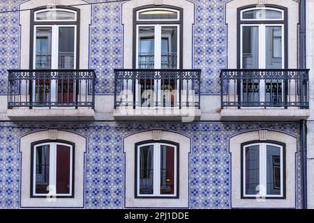 Europe, Portugal, Lisbon. Typical ceramic tiled blue and white azulejos tiles on a building. Stock Photo
