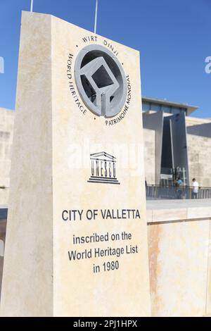 Stone Monument to the city of Valletta which is located just outside the main gate in front of Triton fountain which was inscribed on the world heritage list in 1980. Stock Photo