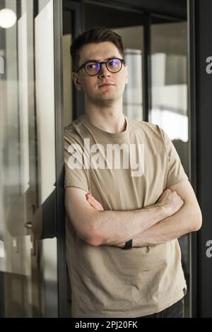 Modern Office: Portrait of Stylish Developer, Data Analysis and Creative Designer. Digital Entrepreneur Works on e-Commerce Startup Stock Photo