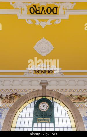 Europe, Portugal, Porto. April 7, 2022. Yellow ceiling in the Sao Bento Railway Station. Stock Photo