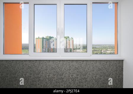 White plastic windows inside the apartment building Stock Photo