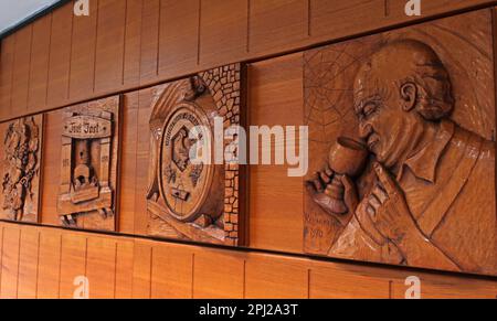 Wooden carvings, Toni Jost vineyard, winery 1831-1970, Bacharach (Bacharach am Rhein), Mainz-Bingen district, Germany Stock Photo