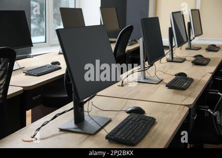 Many modern computers in open space office Stock Photo