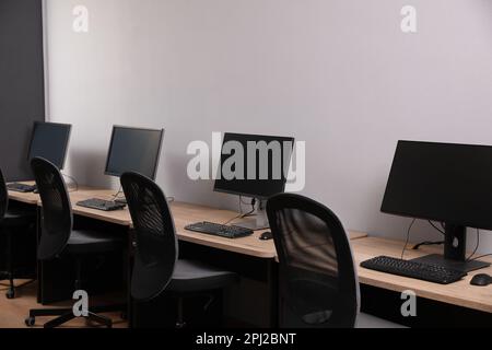 Many modern computers in open space office Stock Photo