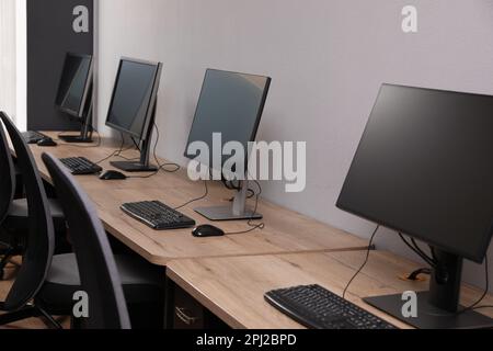 Many modern computers in open space office Stock Photo