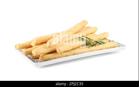 Delicious grissini with rosemary isolated on white. Crusty breadsticks Stock Photo