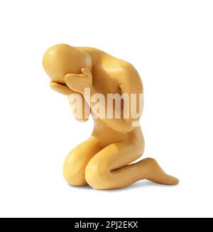 Plasticine figure of crying human isolated on white Stock Photo