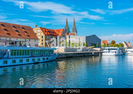 Regensburg, Germany, August 13, 2022: Steamboats mooring at the waterfront of Regensburg, Germany. Stock Photo