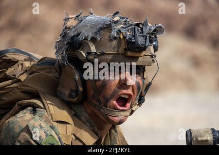 Twentynine Palms, California, USA. 7th Mar, 2023. U.S. Marine Corps Lance Cpl. Jose Sardina Jr, a rifleman with 3rd Battalion, 5th Marine Regiment, 1st Marine Division, passes commands to his squad during a company level attack exercise at Marine Corps Air Ground Combat Center, Twentynine Palms, California, March 7, 2023. Company level training ensures that Marines are trained in breaching obstacles, working under pressure, and adapting to changing scenarios. Credit: U.S. Marines/ZUMA Press Wire Service/ZUMAPRESS.com/Alamy Live News Stock Photo