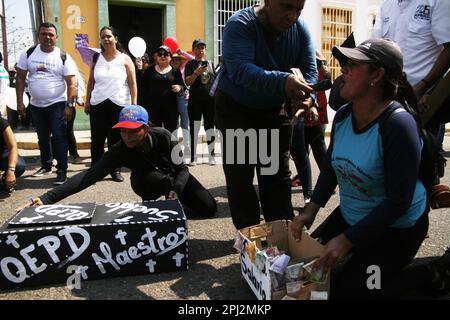 Maracaibo, Venezuela. 30th Mar, 2023. Workers take part during a demonstration to demand decent wages, Hundreds of unions join in the protest which was called 'Via Crucis of the workers'' due the the serious salary crisis. on March 30, 2023 in Marcaibo, Venezuela. (Photo by Humberto Matheus/ Eyepix Group)./Eyepix Group (Credit Image: © Humberto Matheus/eyepix via ZUMA Press Wire) EDITORIAL USAGE ONLY! Not for Commercial USAGE! Stock Photo