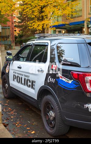 A police utility vehicle operated by the Royal Canadian Mounted Police RCMP. RCMP vehicle car stopped on a street of Vancouver. Street photo-Vancouver Stock Photo