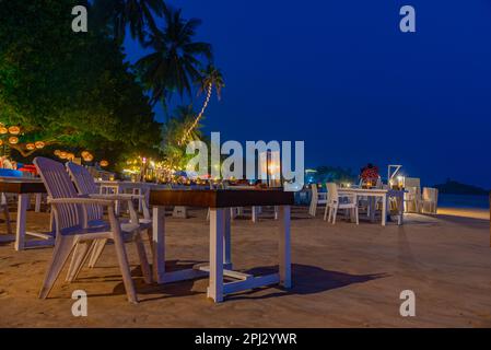 Mirissa, Sri Lanka, January 22, 2022: Sunset view of a beach restaurant at Mirissa beach, Sri Lanka. Stock Photo