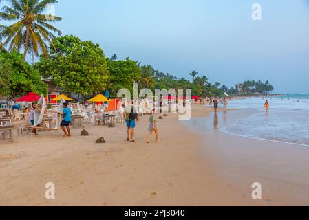 Mirissa, Sri Lanka, January 22, 2022: Sunset view of a beach restaurant at Mirissa beach, Sri Lanka. Stock Photo