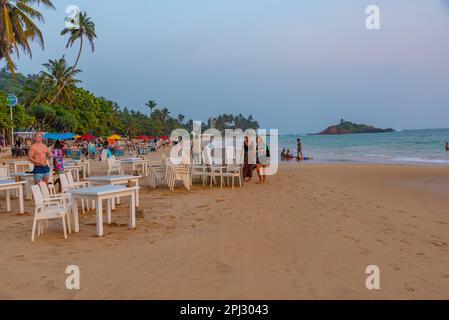 Mirissa, Sri Lanka, January 22, 2022: Sunset view of a beach restaurant at Mirissa beach, Sri Lanka. Stock Photo