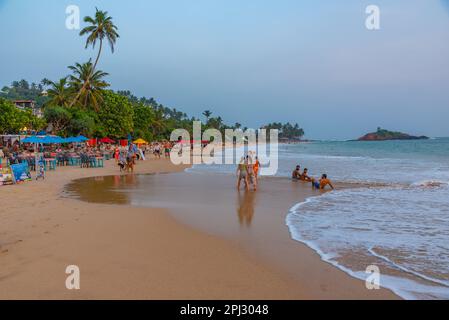 Mirissa, Sri Lanka, January 22, 2022: Sunset view of a beach restaurant at Mirissa beach, Sri Lanka. Stock Photo
