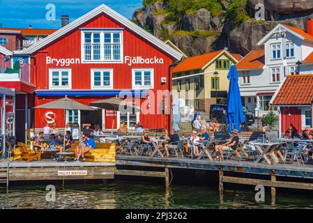 Fjällbacka, Sweden, July 11, 2022: Waterfront promenade at Swedish village Fjällbacka. Stock Photo