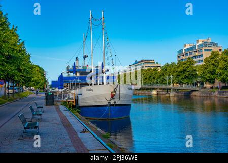 Turku, Finland, July 20, 2022: Boats mooring alongside river Aura in Turku, Finland. Stock Photo