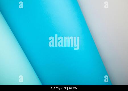 Color papers flat composition background with light and dark blue and grey with copy space Stock Photo