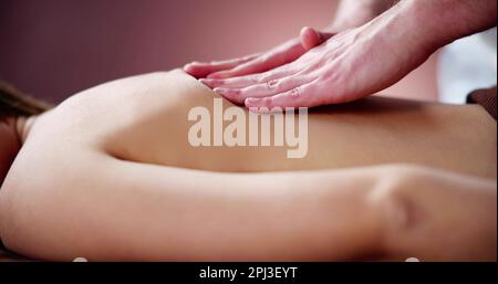 Woman Receiving Back Massage Stock Photo, Royalty-Free