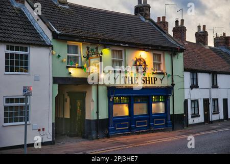 The Ship pub, lit up in early evening Stock Photo