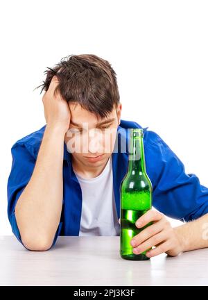 Sad Young Man in Alcohol Addiction Isolated on the White Background Stock Photo