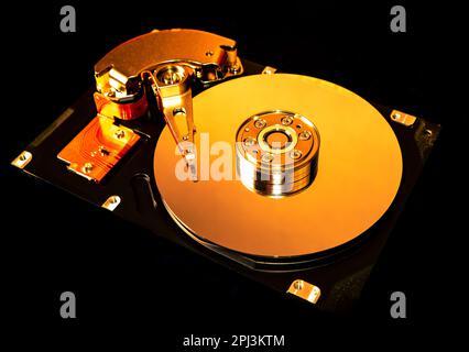 Toned Photo of the Opened Hard Disk Drive closeup Stock Photo