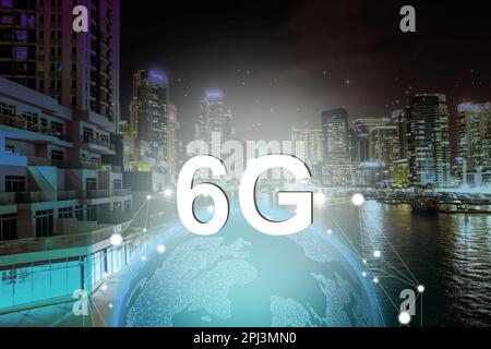 6G wireless network. Illustration of Earth and beautiful view of night cityscape Stock Photo