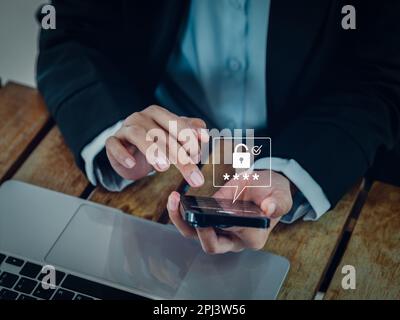 Unlocked mobile phone, cyber security technology concepts. Padlock and passcode code symbol showing on smartphone in person hands after validate passw Stock Photo