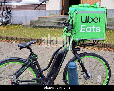 Delivery bike from Uber Eats meal delivery service in The Hague the Netherlands Stock Photo