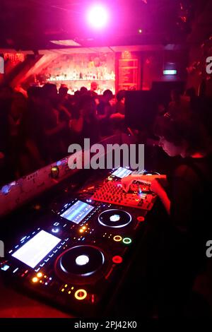 Munich, Germany. 27th Jan, 2023. A djane plays at the Harry Klein Club. The Harry Klein is located in the area of Sendlinger Tor, Sonnenstraße, Maximilansplatz, in the so-called Feierbanane. Credit: Felix Hörhager/dpa/Alamy Live News Stock Photo