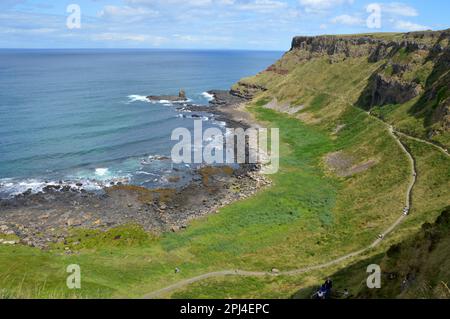 Northern Ireland, County Antrim, Causeway Coast:  view of Port Noffer (Giant's Bay) from the cliff path at the top of the Shepherd's steps. Stock Photo