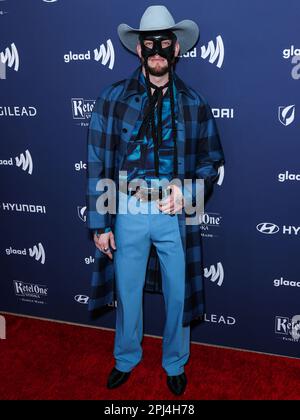 Beverly Hills, United States. 30th Mar, 2023. BEVERLY HILLS, LOS ANGELES, CALIFORNIA, USA - MARCH 30: South African country musician Orville Peck arrives at the 34th Annual GLAAD Media Awards Los Angeles held at The Beverly Hilton Hotel on March 30, 2023 in Beverly Hills, Los Angeles, California, United States. (Photo by Xavier Collin/Image Press Agency) Credit: Image Press Agency/Alamy Live News Stock Photo