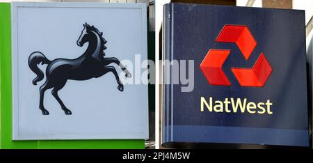 Undated file photo of signage for Lloyds Bank and NatWest bank. Two of the UK's biggest banking groups have announced plans to make big cuts to their branch networks this year, cutting more than 80 sites from around the country. Lloyds Group and NatWest Group have said that the sites in England, Scotland, Wales and the Isle of Man will close between July and November this year. Issue date: Friday March 31, 2023. Stock Photo