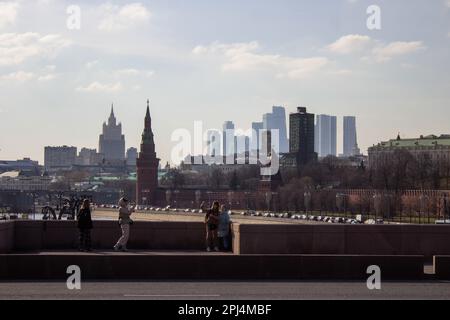 Moscow, Russia. 28th Mar, 2023. People take photos on the Bolshoy Moskvoretsky Bridge. (Credit Image: © Vlad Karkov/SOPA Images via ZUMA Press Wire) EDITORIAL USAGE ONLY! Not for Commercial USAGE! Stock Photo