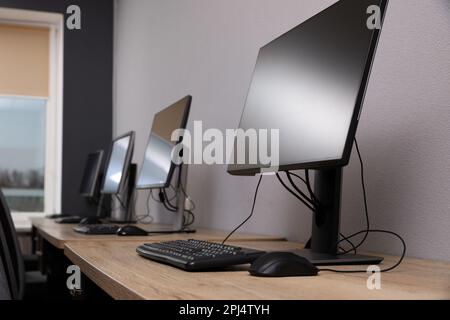 Many modern computers in open space office Stock Photo