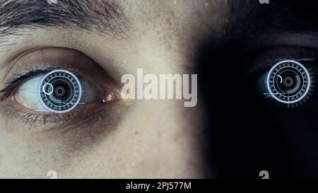 Close-up of a male eye with visual effects. The concept of a sensor implanted in the human eye. Business, computer, cyberspace. Stock Photo