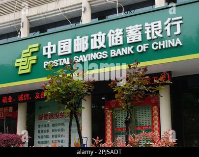 YICHANG, CHINA - MARCH 31, 2023 - A view of the Postal Savings Bank of China in Yichang, Hubei province, China, March 31, 2023. China Mobile Group has Stock Photo