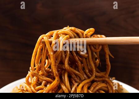 Stir-fried Chinese noodles and vegetables in sweet and sour sauce Yakisoba Stock Photo