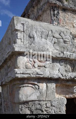 Corner frieze of he Temple of the Frescoes dating to c11th century,  depicting the rain God, Chaac, Tulum, Mexico Stock Photo