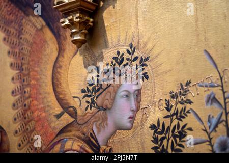 Detail of the Angel Gabriel from the Annunciation by Simone Martini & Lippo Memmi, altarpiece, 14th-century, Uffizi gallery Stock Photo