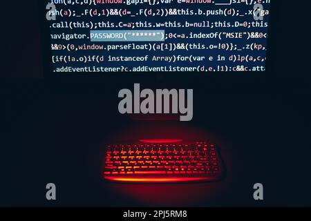 Cyber security. Program code on screen. Using computer and programming to break code. Cyber security threat. Internet and network security. Stealing p Stock Photo
