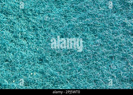 Blue fiber cloth texture. Fabric on a sponge. Background and texture for design. Stock Photo